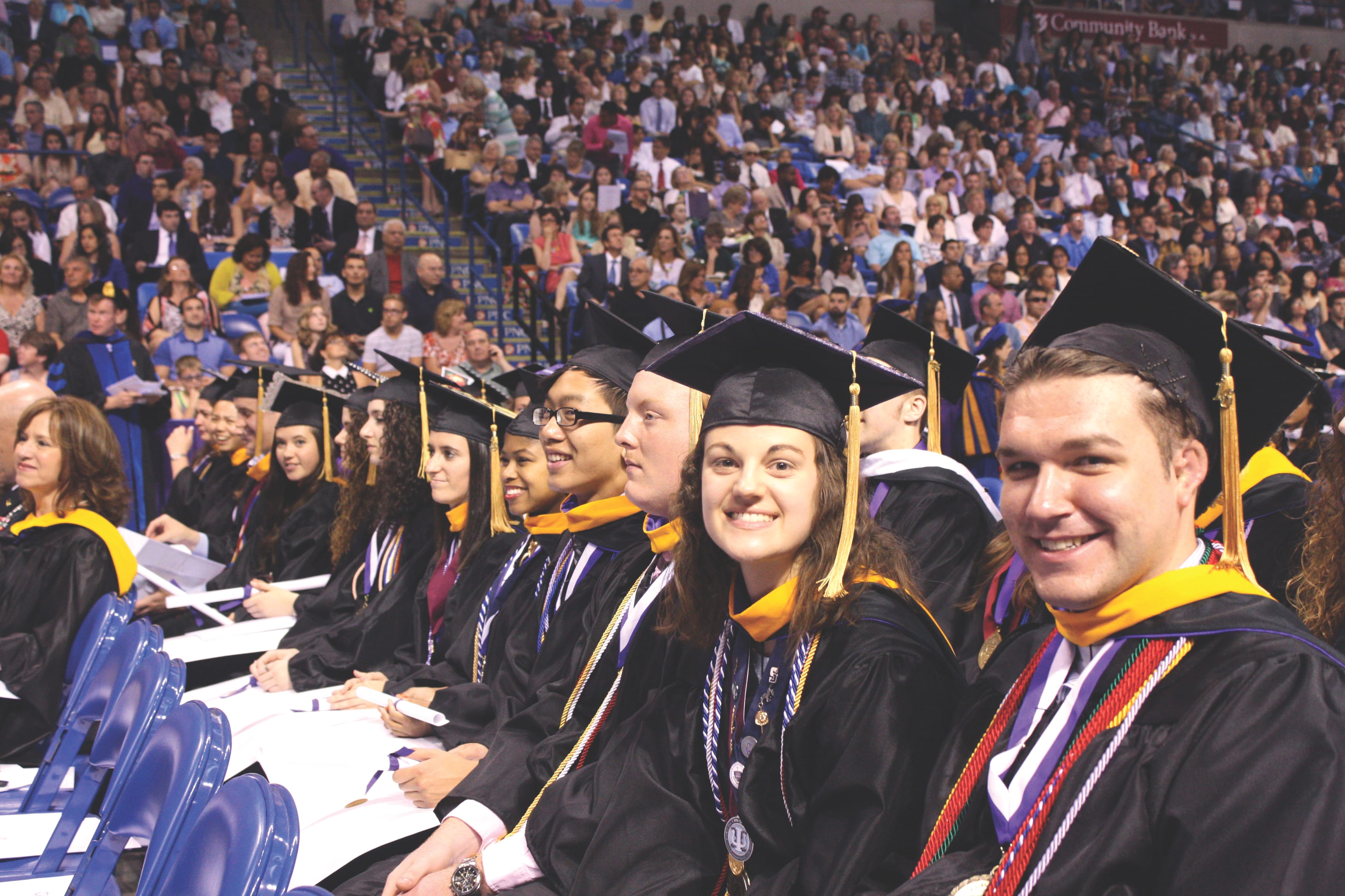 Students Smiling at Graduation